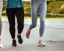 Mature woman performing resistance training to prevent menopausal weight gain and boost metabolic health.